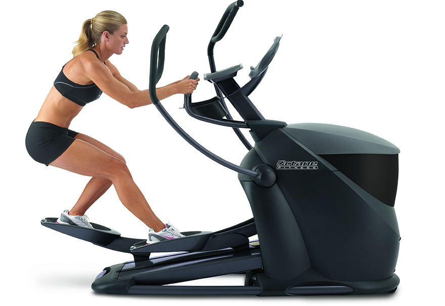 Woman working out on Pro3700c standing elliptical - side view