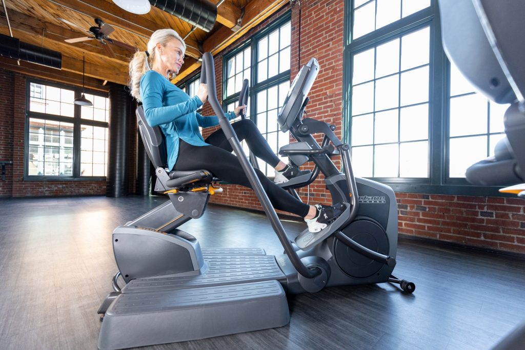 Woman on recumbent elliptical to prevent age-related muscle loss