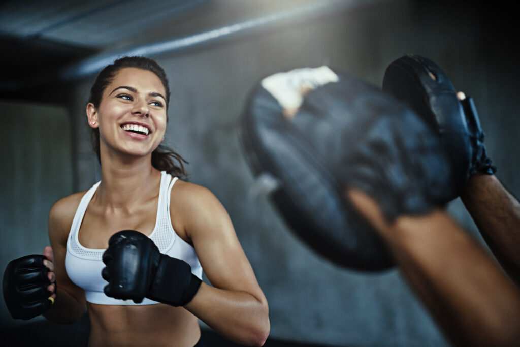 Woman boxing in a gym