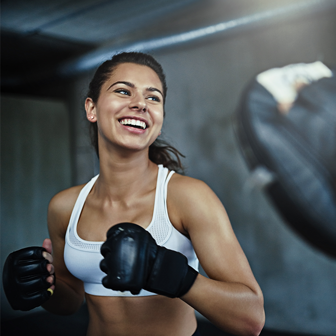 Woman boxing in a gym