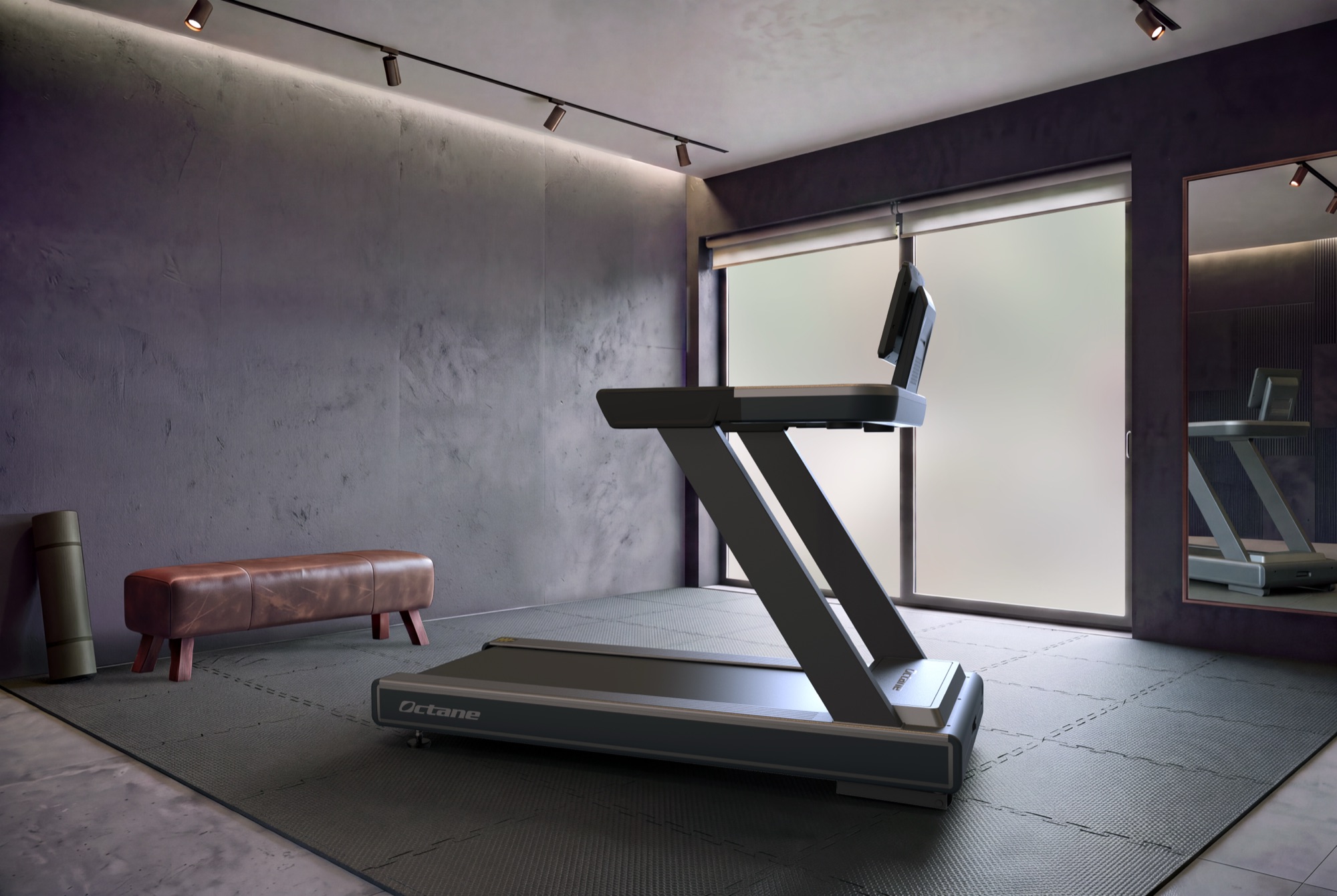 An Octane treadmill centered in a gym room with a bench, a yoga mat, and a large mirror.